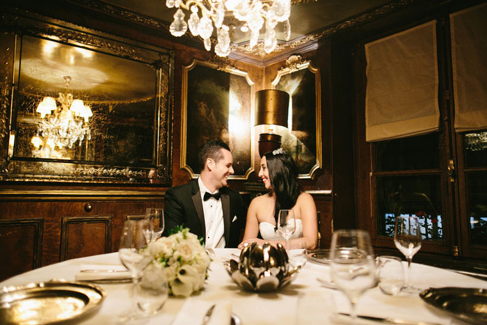 bride and groom in paris restaurant