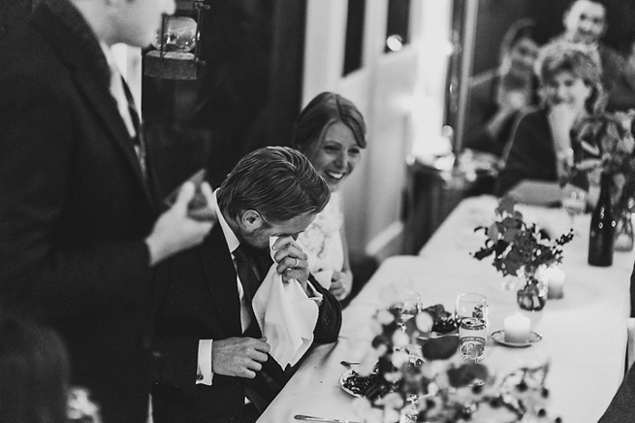 groom crying at reception