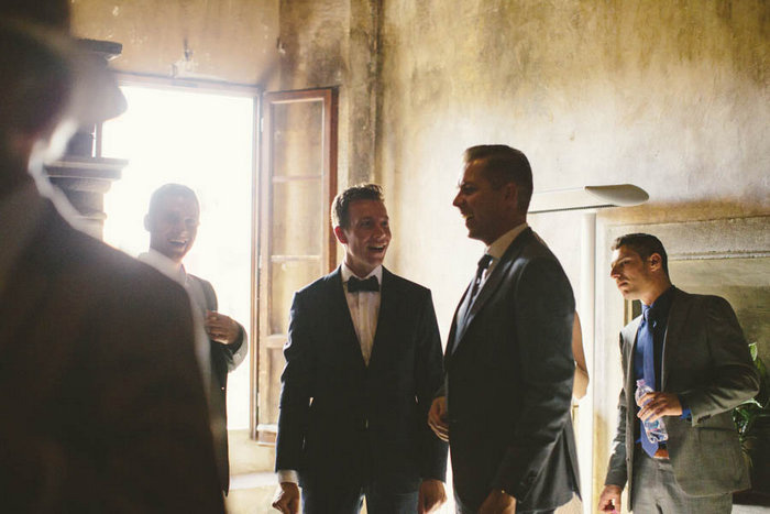 groom with wedding guests