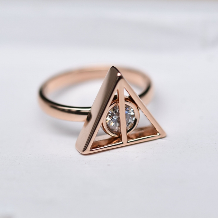The Carat Shop Harry Potter Stainless Steel Ring Golden Snitch, Medium :  Amazon.com.au: Clothing, Shoes & Accessories